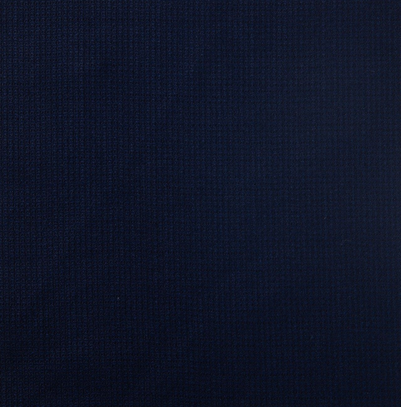 A close up of a navy plaid fabric texture