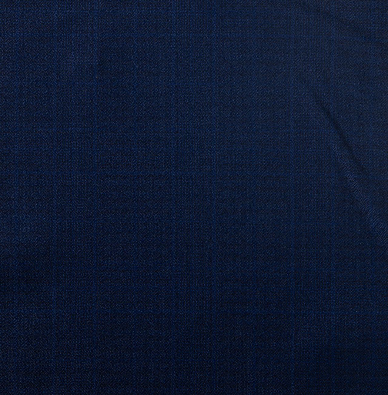 A close up of a blue plaid fabric texture