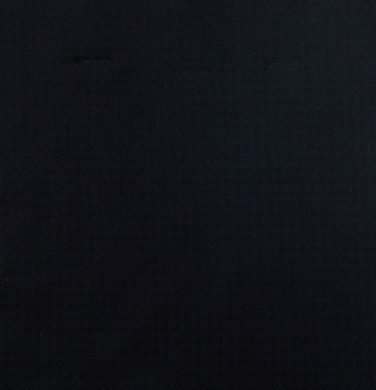 A close up of a black fabric texture