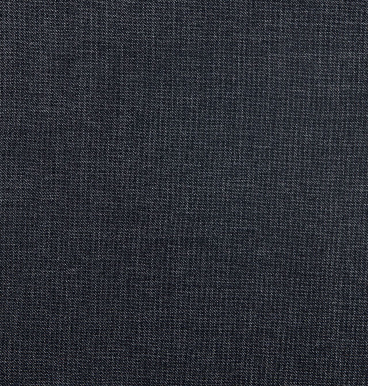 A close up of a dark grey fabric with a pattern on it
