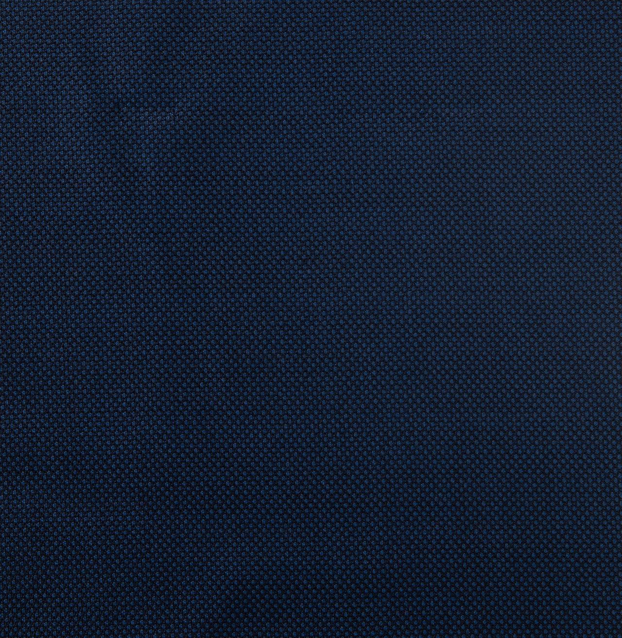 A close up of a blue fabric texture