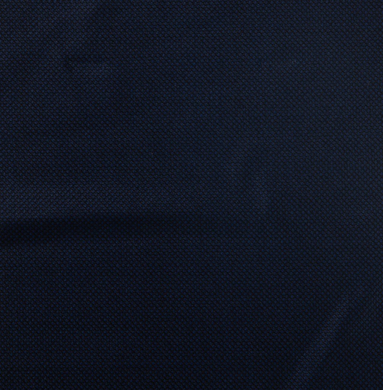A close up of a piece of dark blue fabric