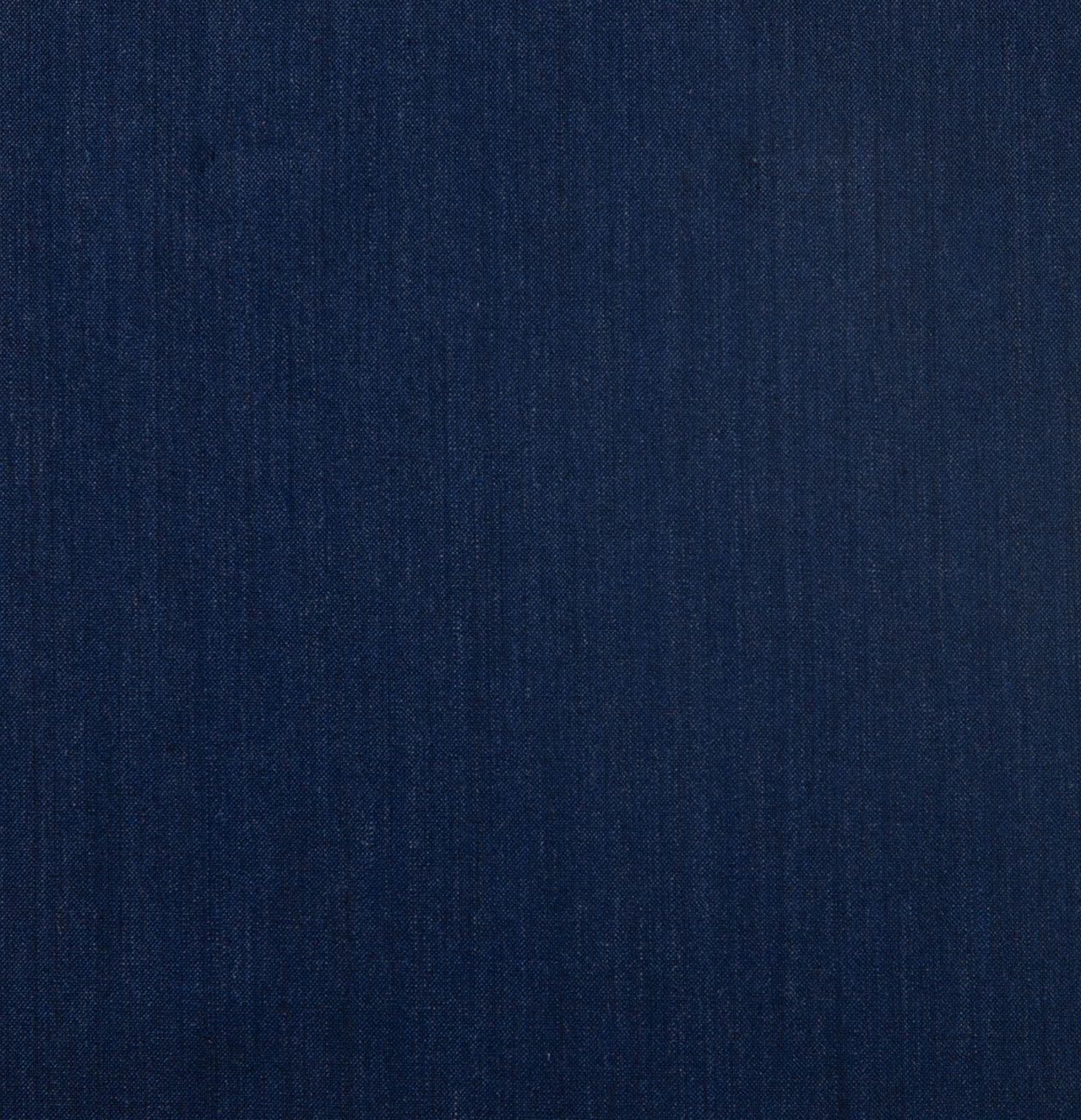 A close up of a blue denim fabric texture