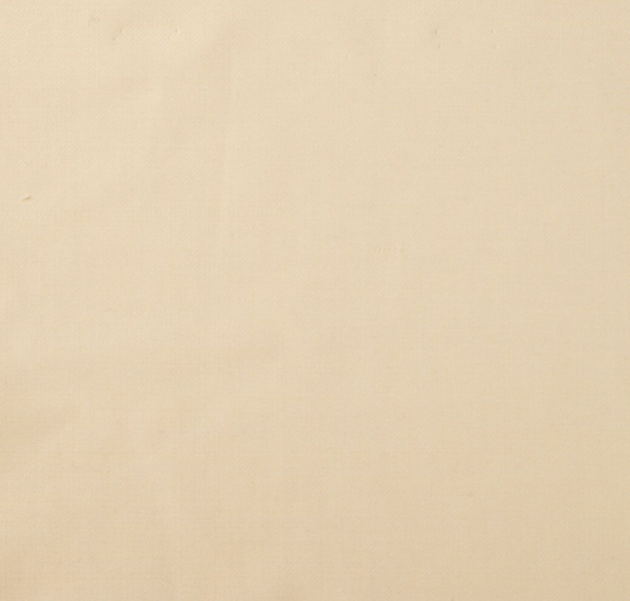 A close up of a piece of light yellow fabric