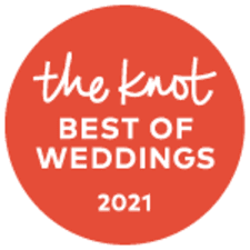 A red circle with the words `` the knot best of weddings '' written on it.