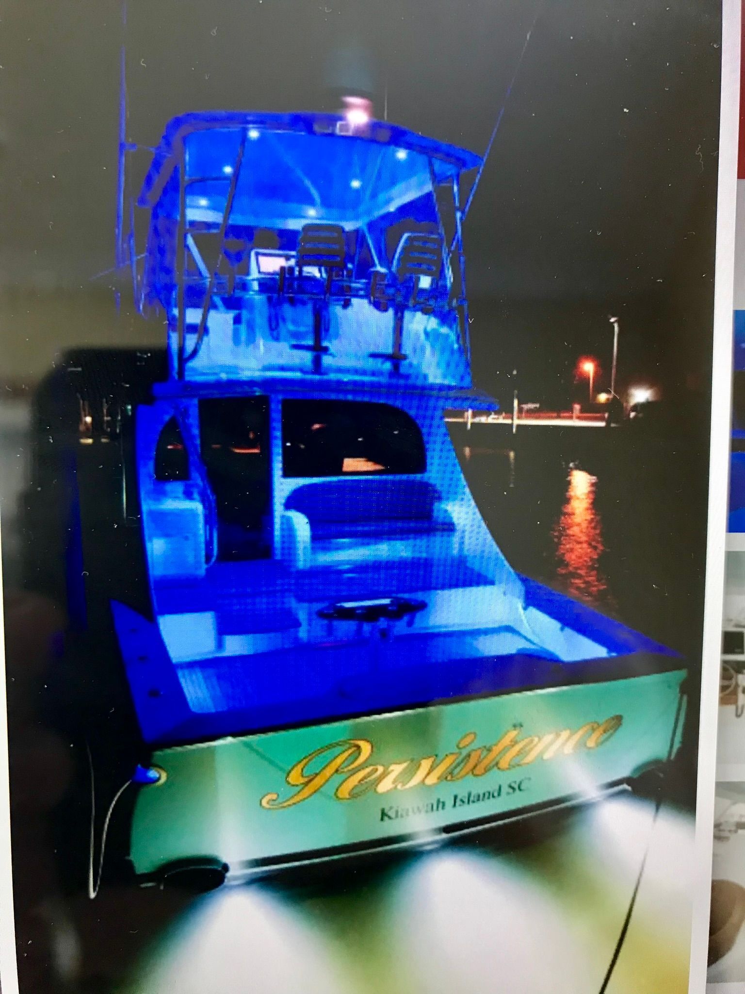 yacht with lights at night