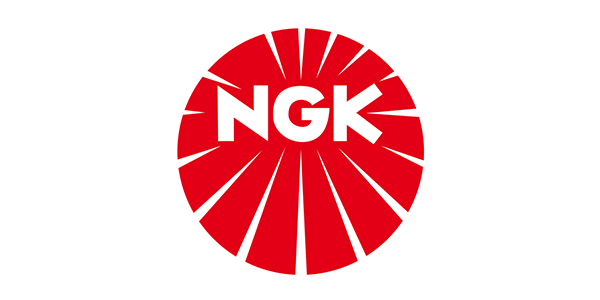 Red NGK logo with white letters inside a red sunburst circle