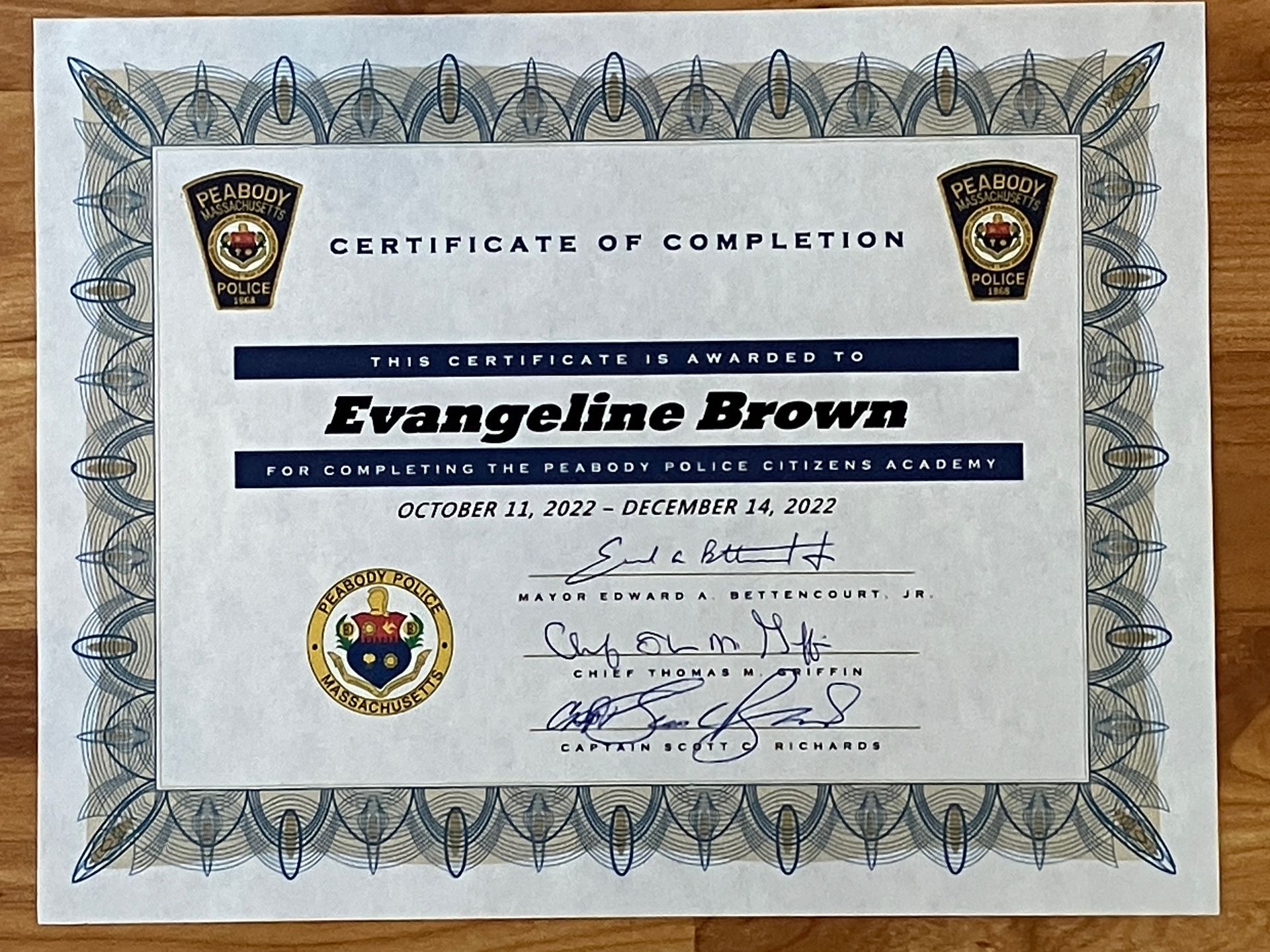 Certificate of completion for Evangeline Brown with ornate border and signatures