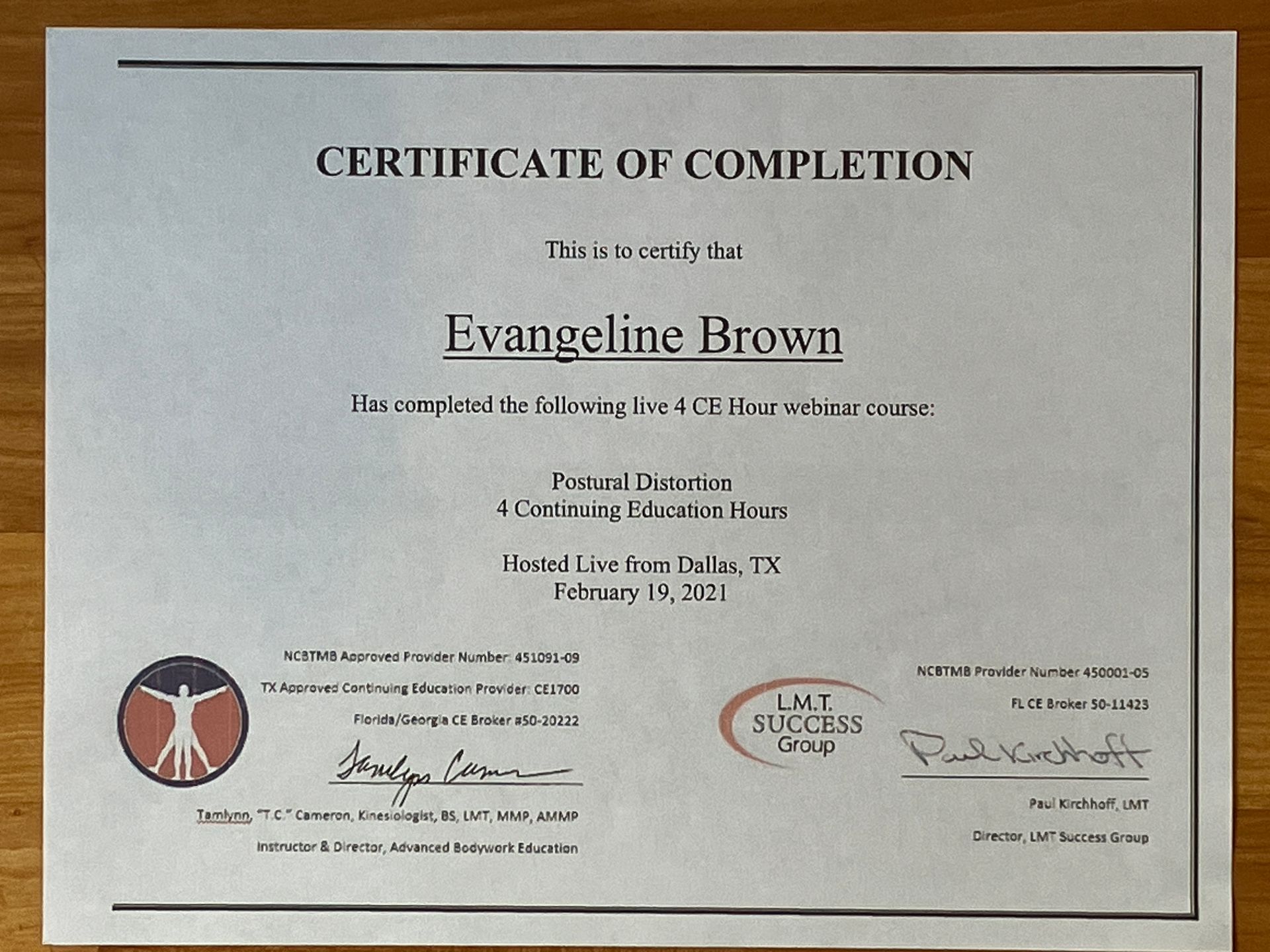 Certificate of completion with the name Evangeline Brown centered on a white page with signatures at the bottom