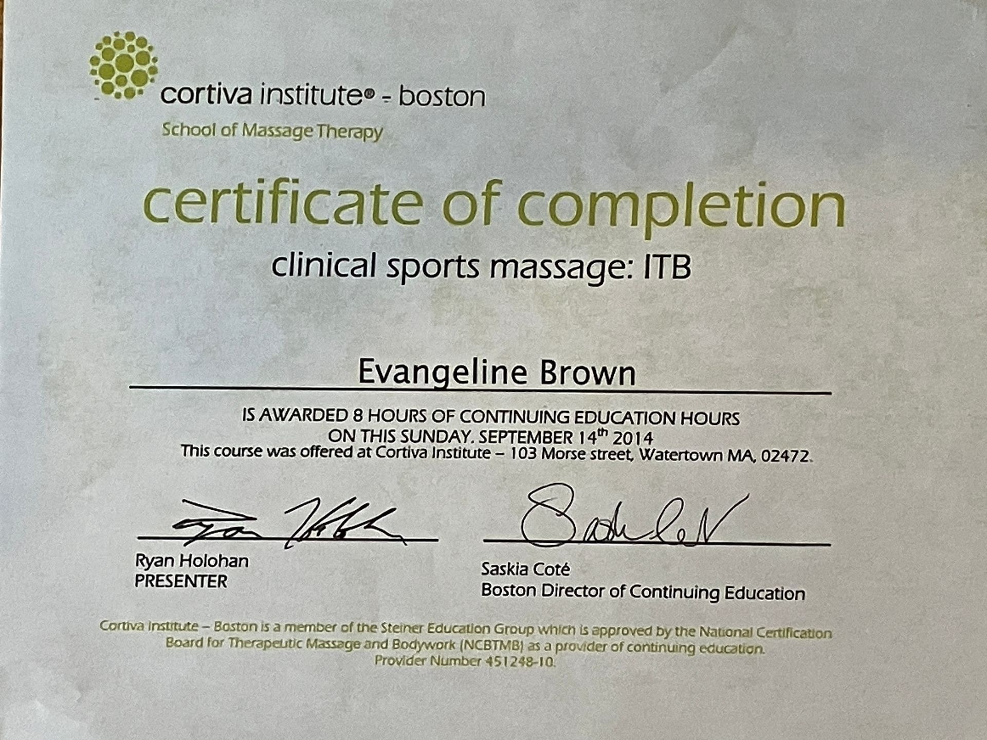 Certificate of completion for clinical sports massage, with printed name and signatures on a pale green background