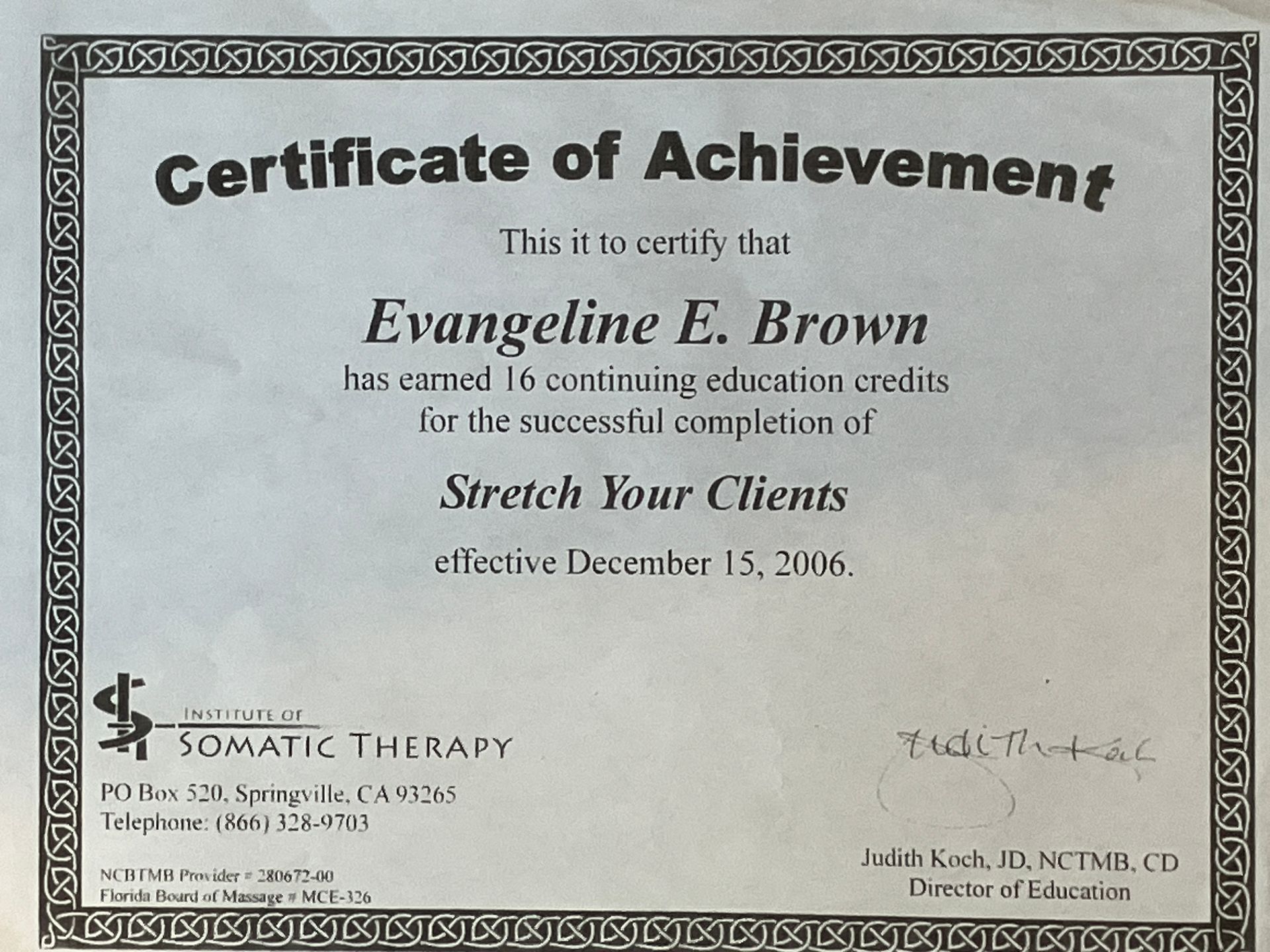 Certificate of Achievement for Evangeline F. Brown, with ornate border and signatures.