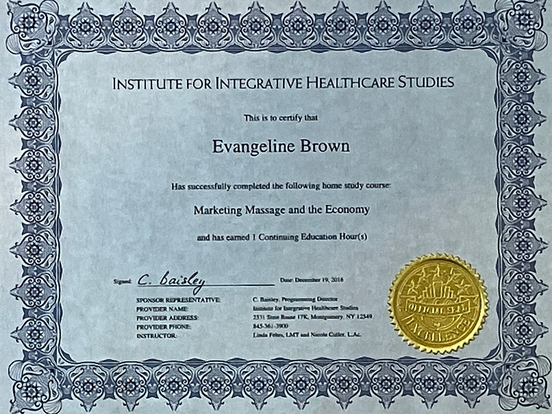 Blue-bordered certificate for Evangelina Brown from the Institute for Integrative Healthcare Studies, with gold seal.