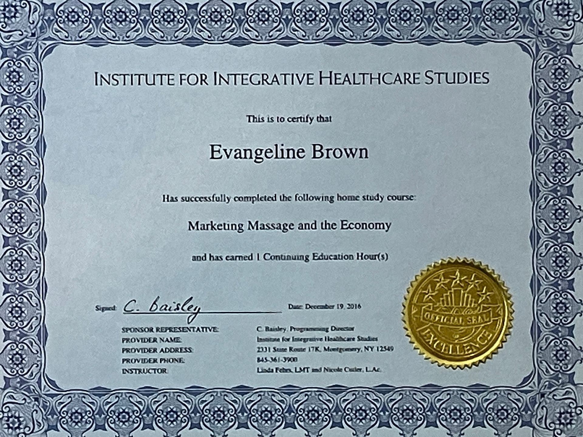 Blue diploma certificate for Evangeline Brown from the Institute for Integrative Health Care Studies with gold seal