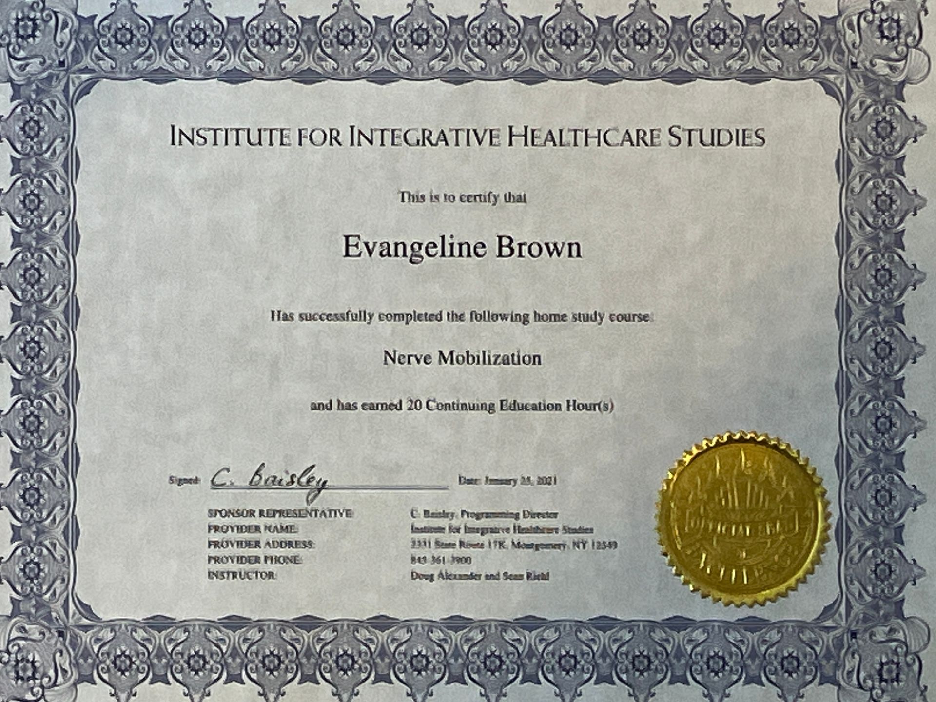 Certificate from the Institute for Integrative Healthcare Studies with ornate blue border and gold seal