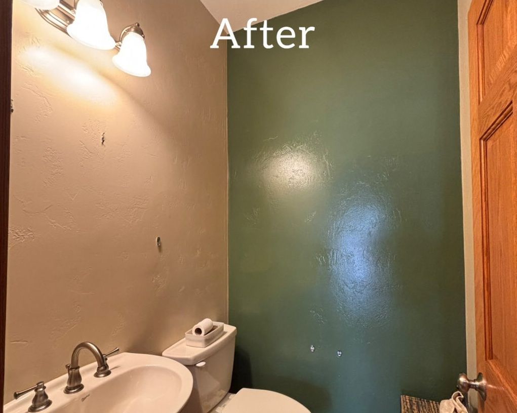 Small bathroom before remodel. Tan and dark gray walls, a wooden door, a toilet, and a sink. - after