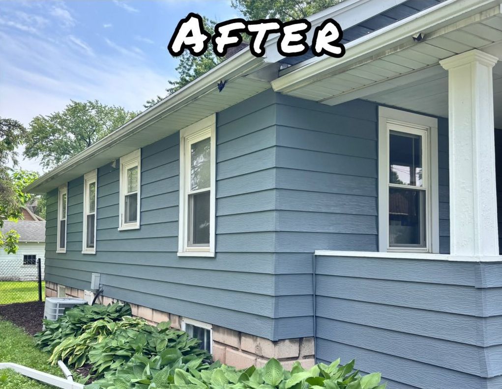 A photo of a yellow house with white trim, gutters, and windows. - after
