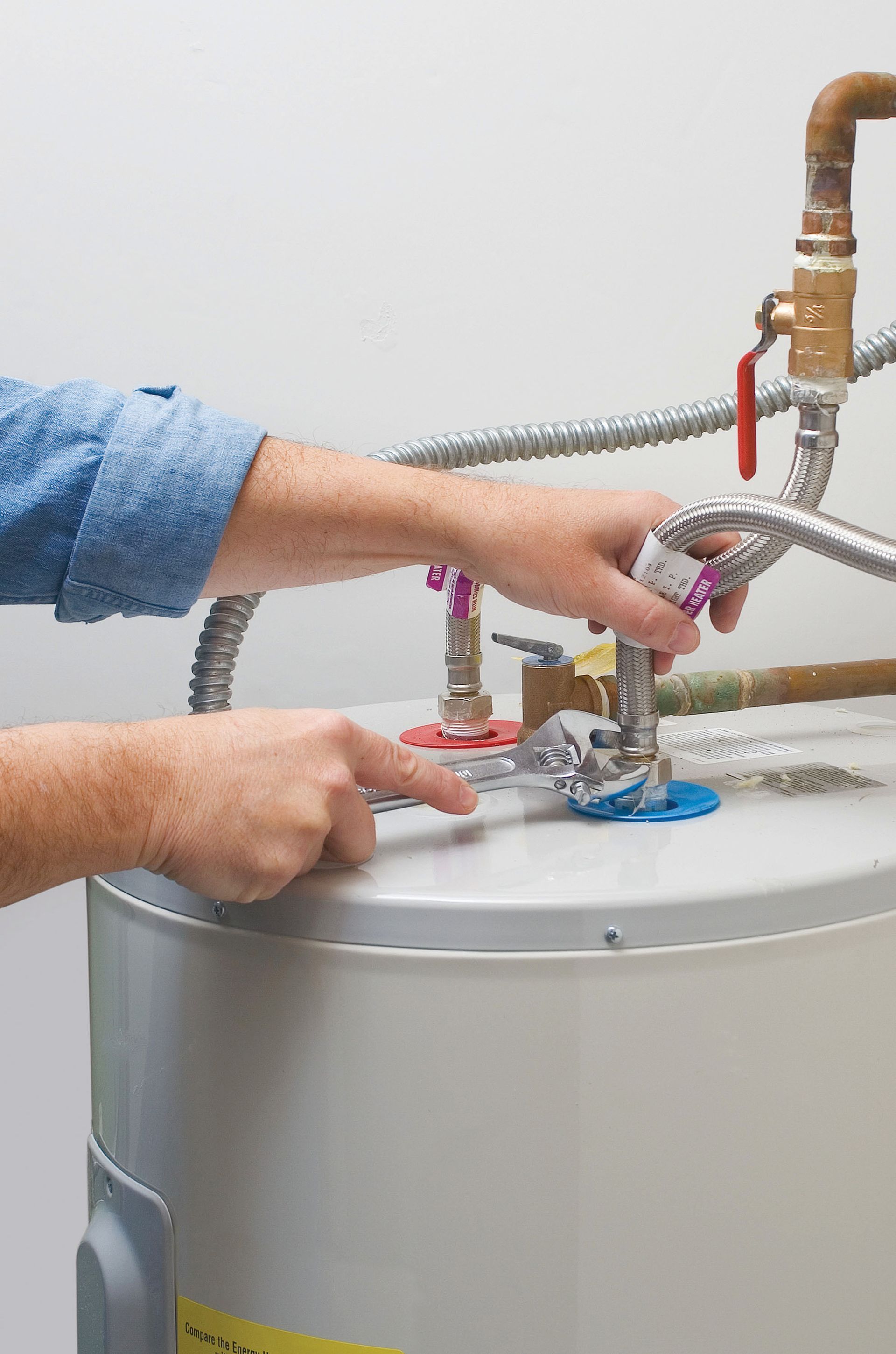 Water heater being repaired