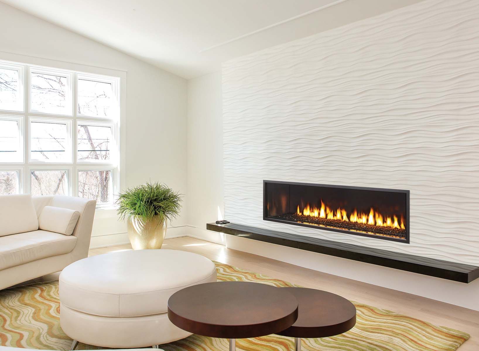 A living room with a fireplace and a couch.