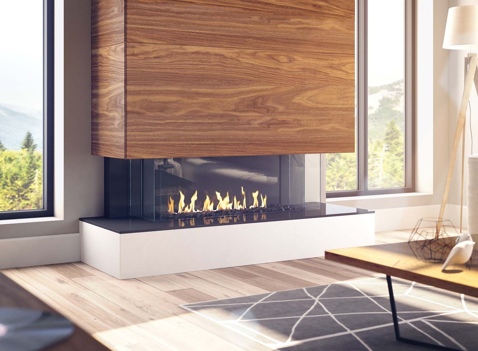 A living room with a fireplace and a large window.