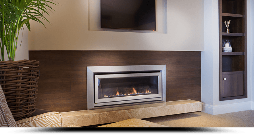 A living room with a fireplace and a flat screen tv.