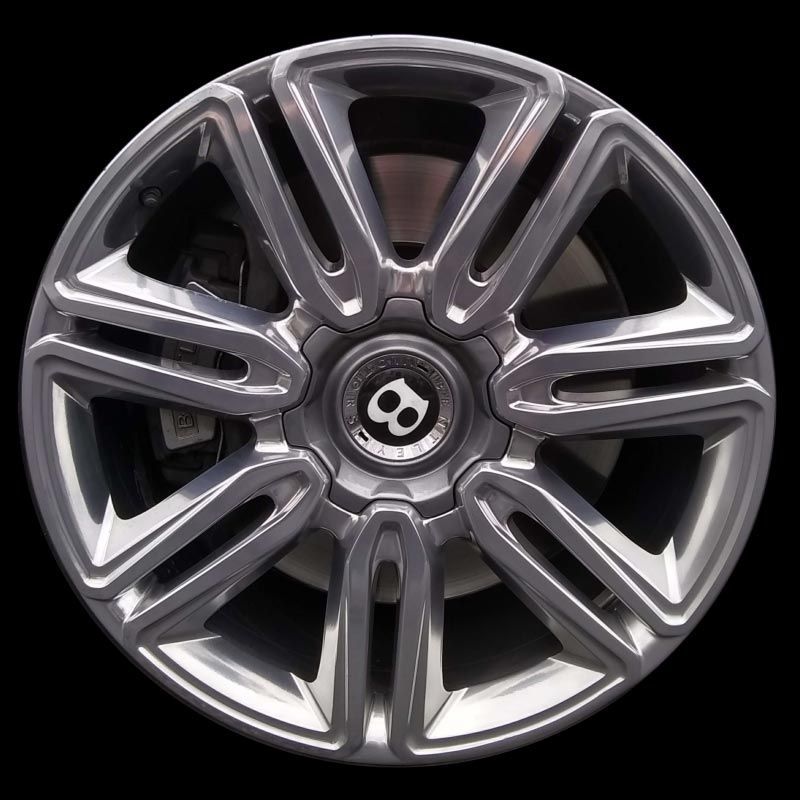 A bentley wheel is shown on a black background