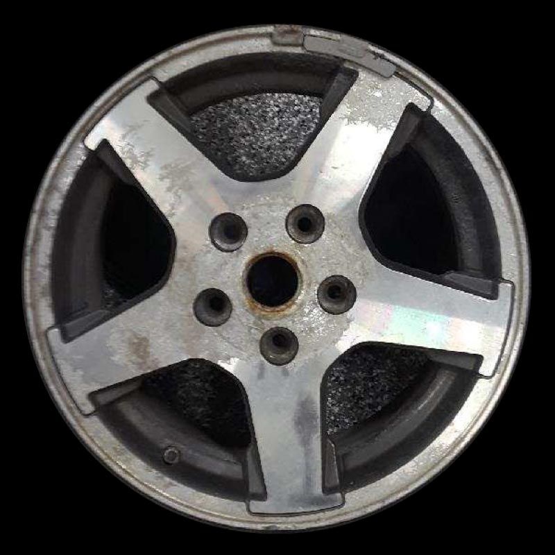 A close up of a wheel on a black background