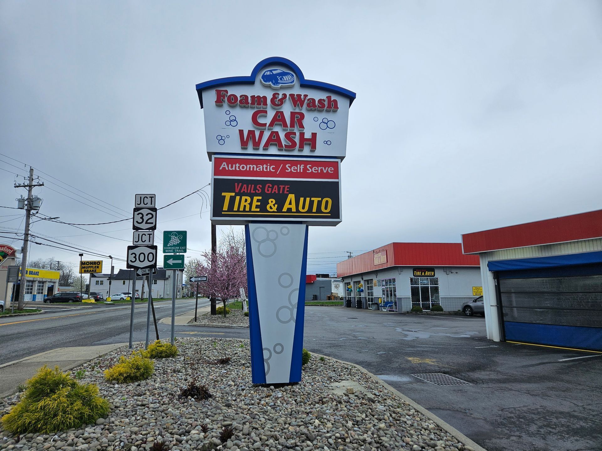 A sign for Vails Gate Tire and Auto