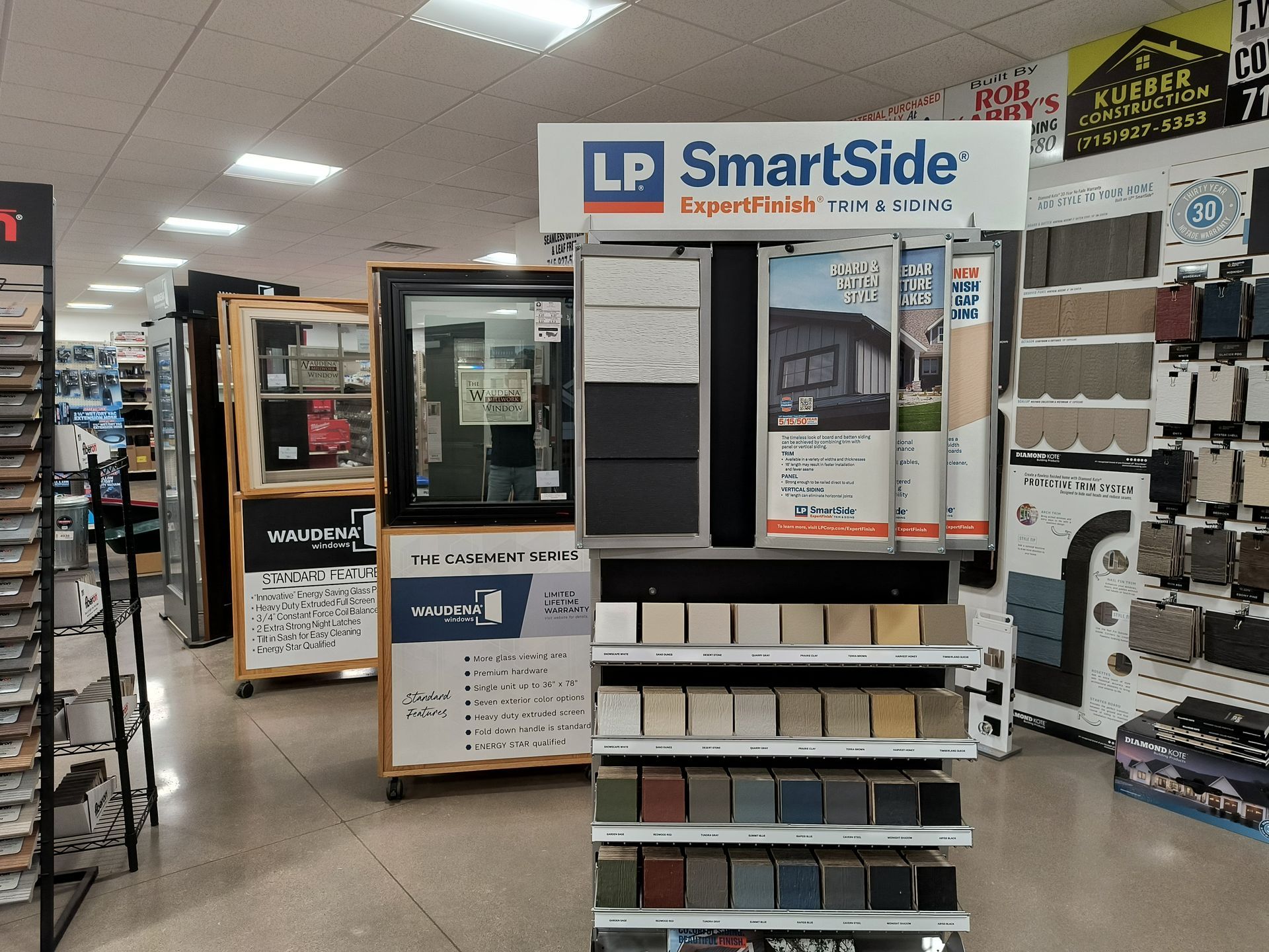 Display of LP SmartSide siding samples in a hardware store.