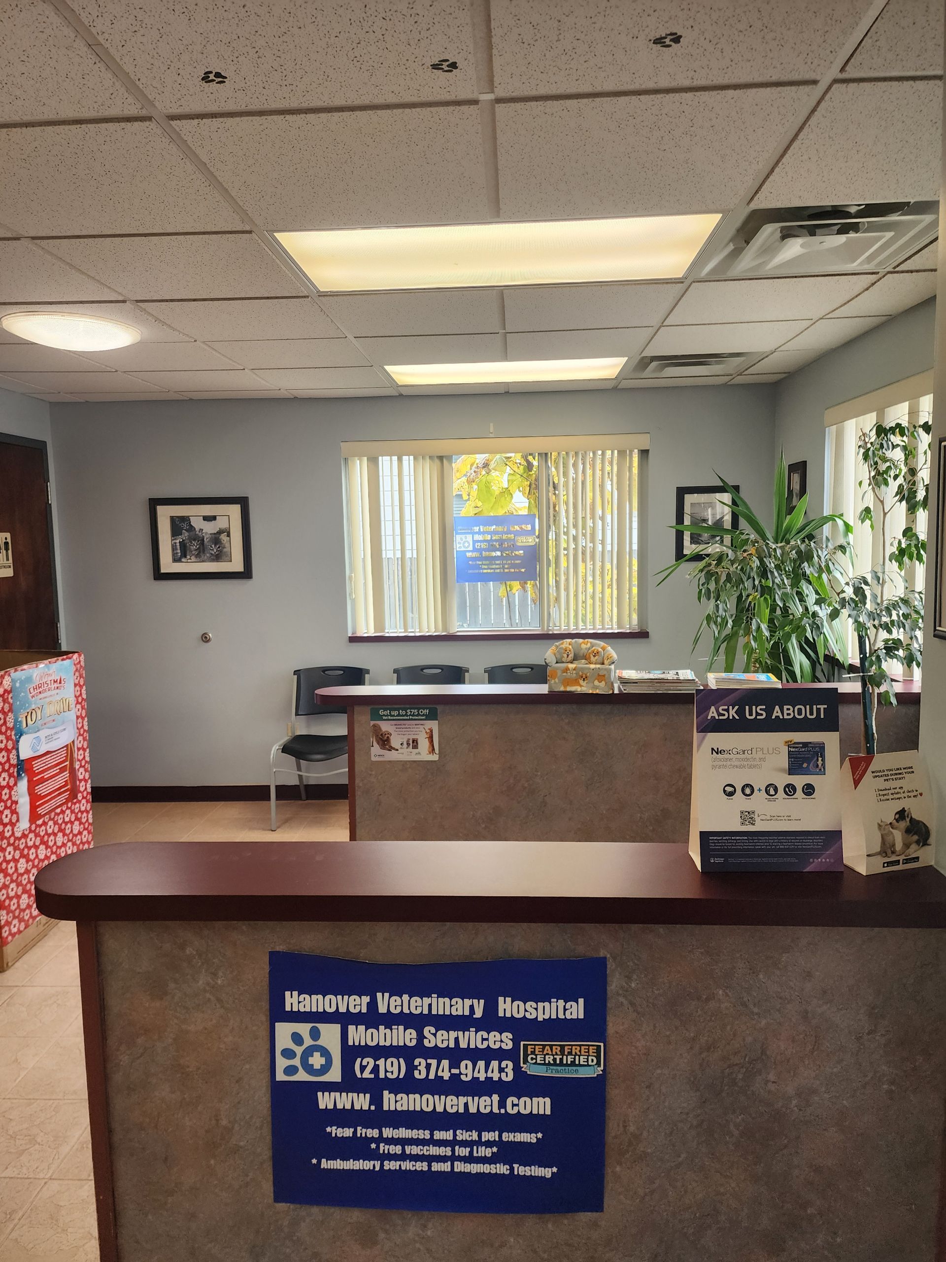 A sign on a counter in a room that says mobile services