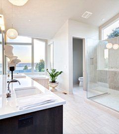 Luxury bathroom with glass partition