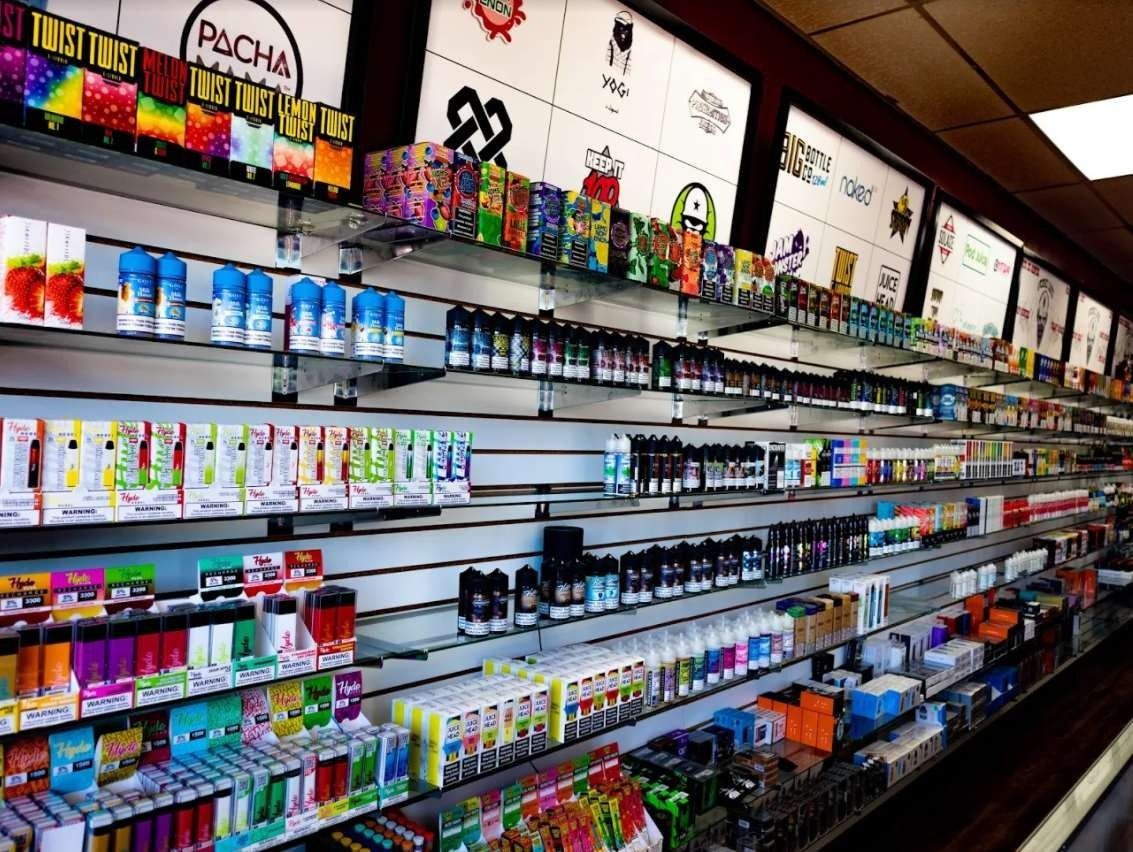 A store filled with lots of different types of cigarettes and e-cigarettes.