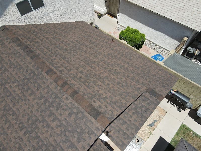 An aerial view of a roof of a house.