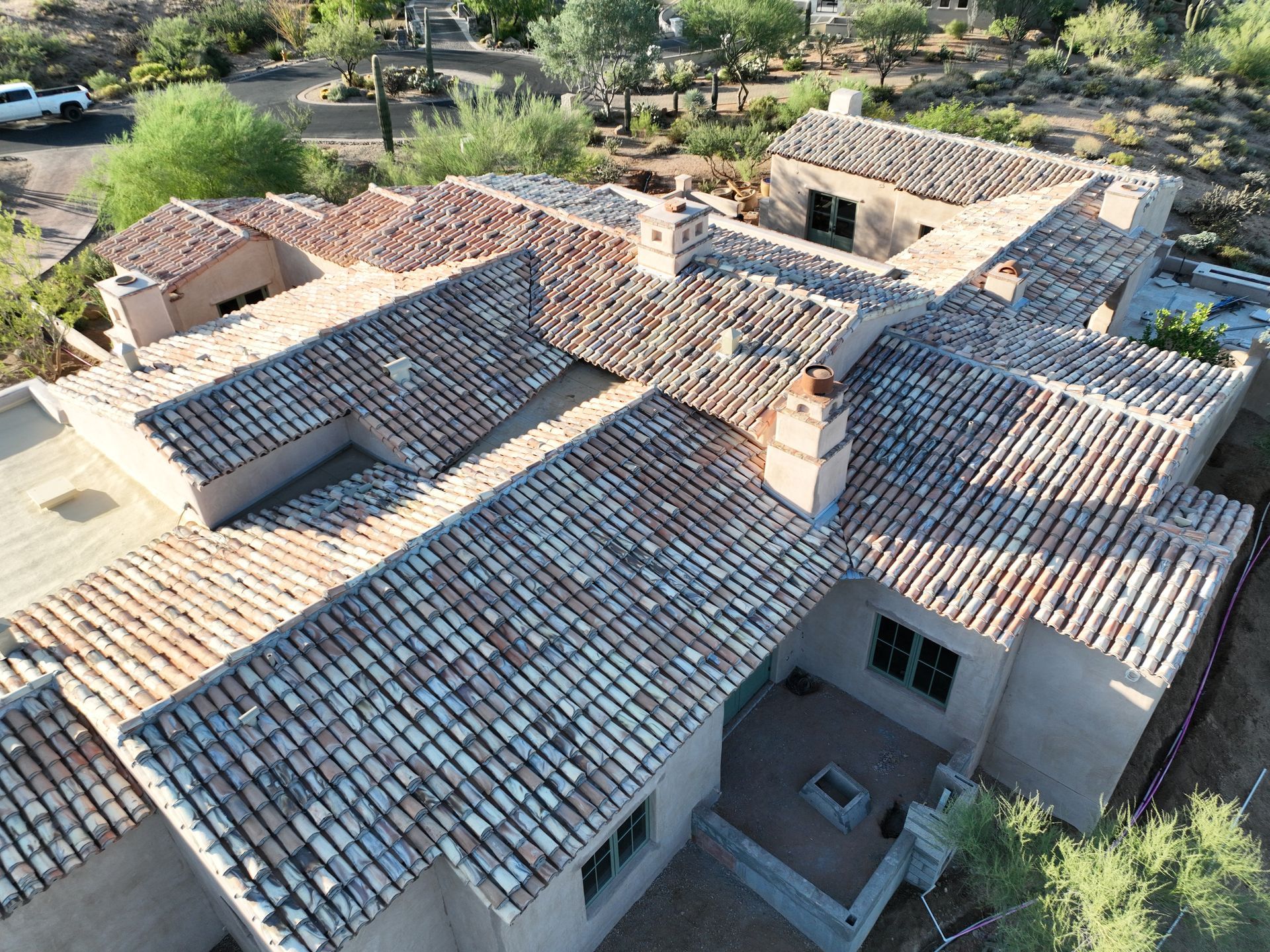 An aerial view of a house with a tiled roof.