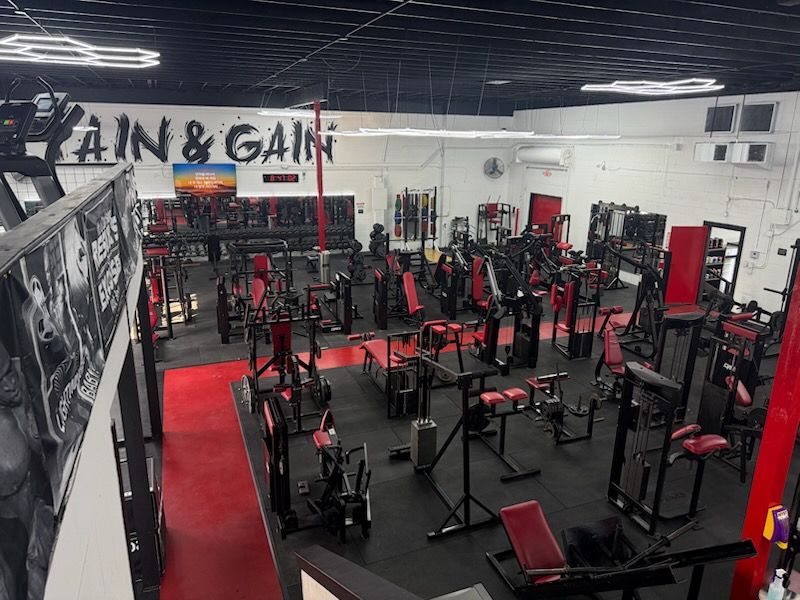 An aerial view of a gym filled with lots of exercise equipment.
