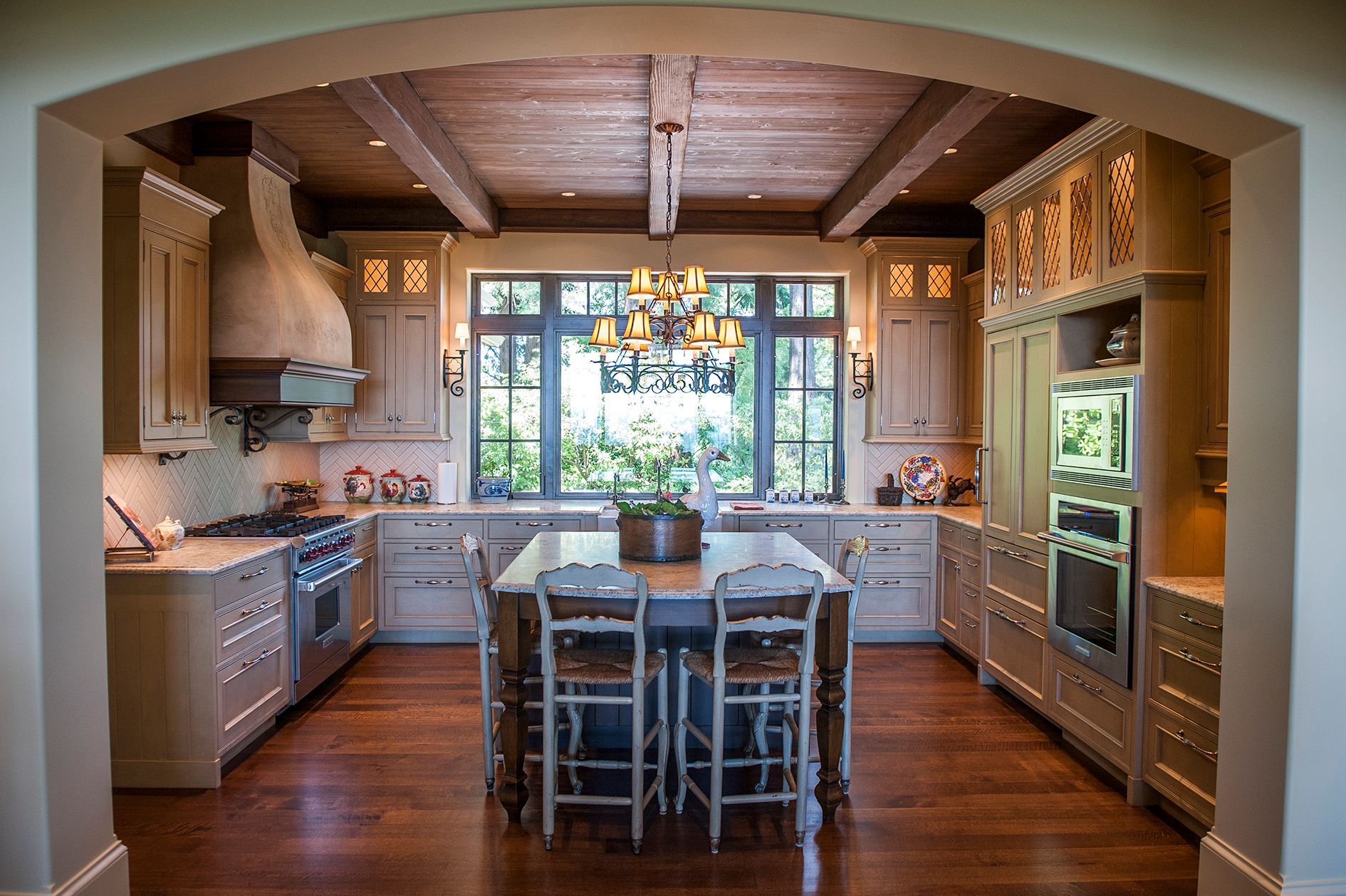 a large kitchen with a large island in the middle