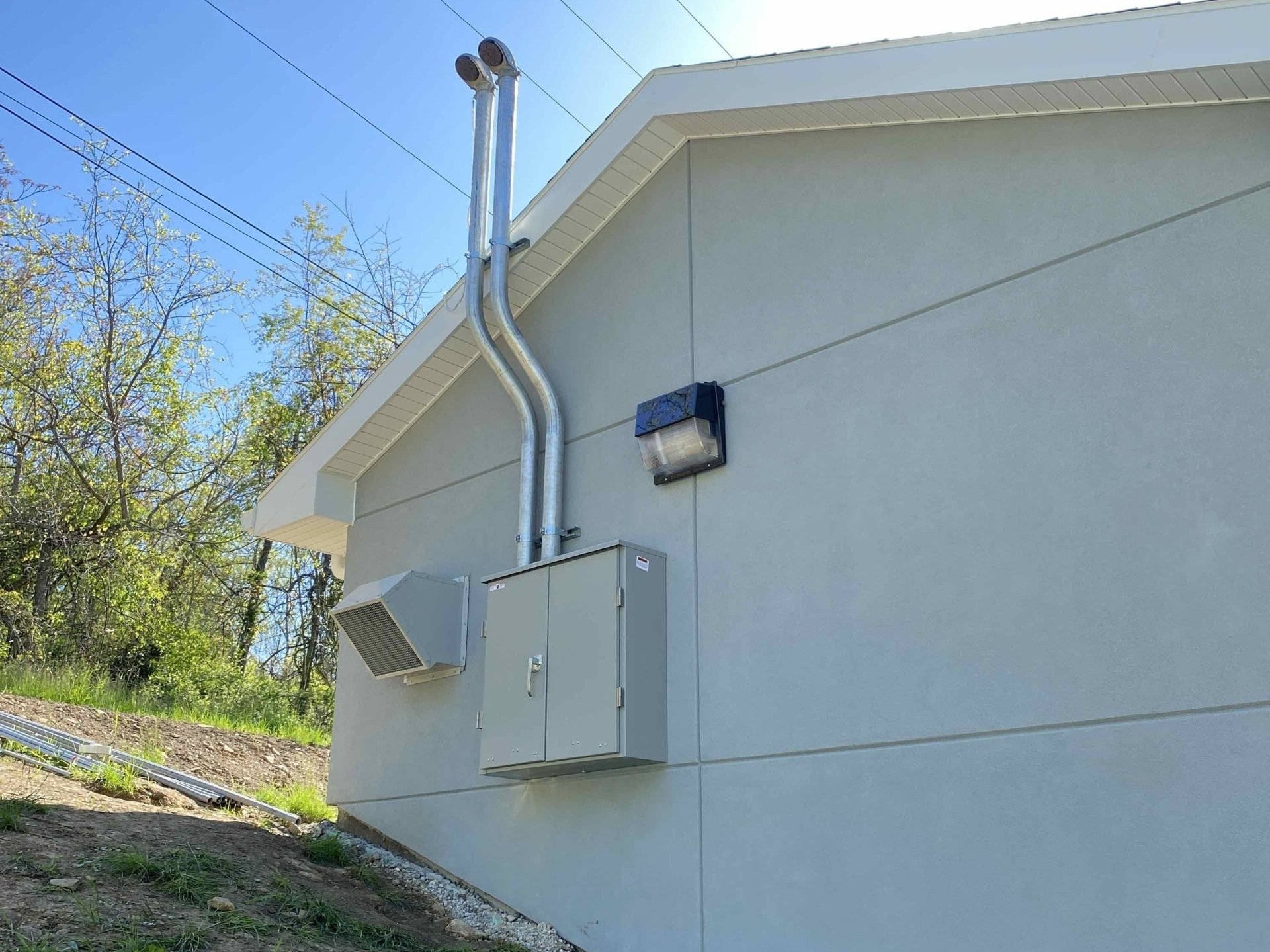 Electrical box on outside of building - Gumpher Electrical Services