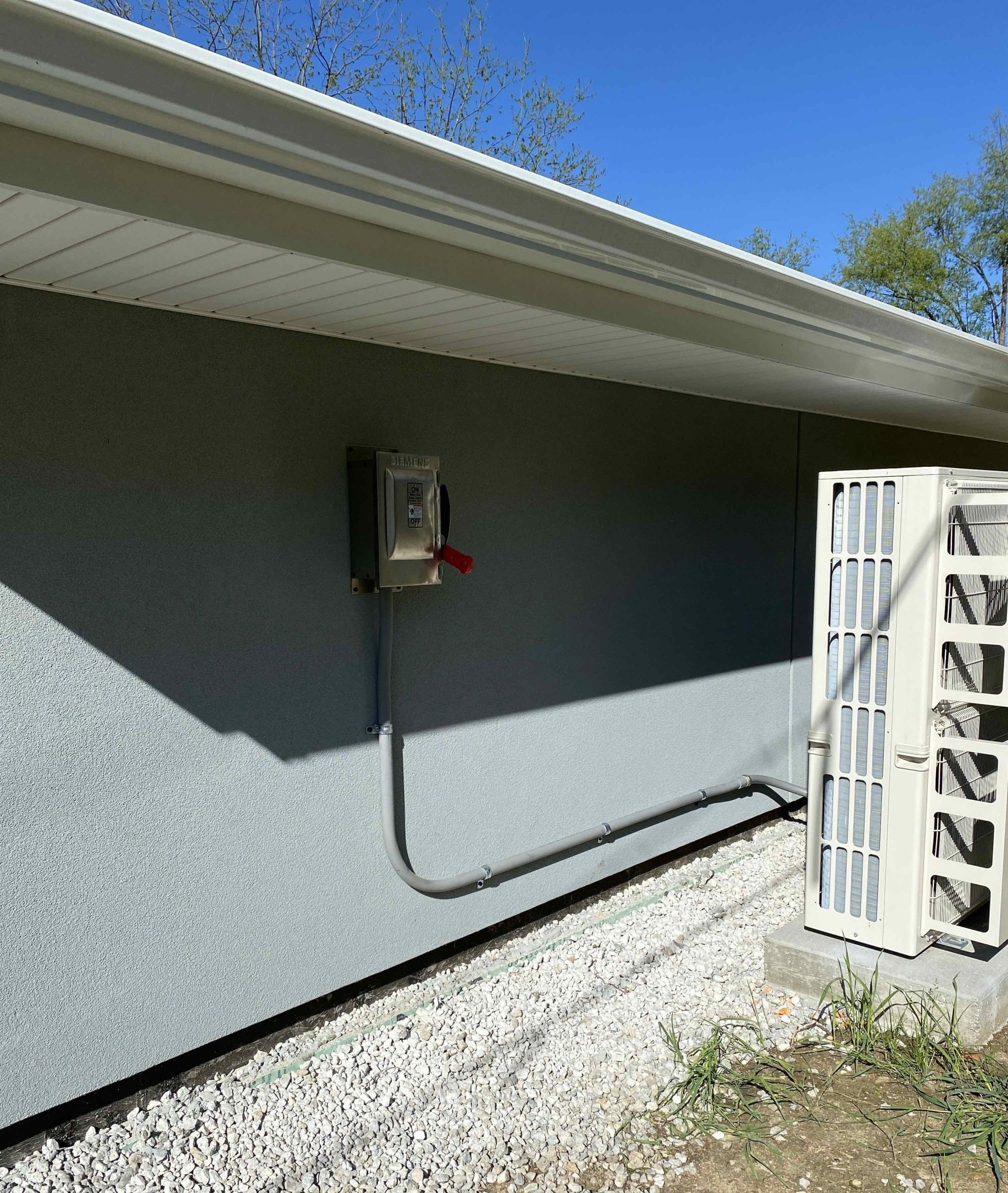 Gumpher Electrical Services, retrofitted electrical  box on outside of building