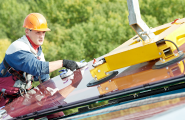 carpenter working with equipment for roof installation