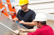 contractors working on installing roof