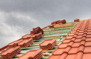 close up roof tiles with gray clouds on background