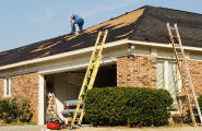 roof of house repaired by a roofer