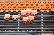 close-up assembled and unassembled tiles used for roofs