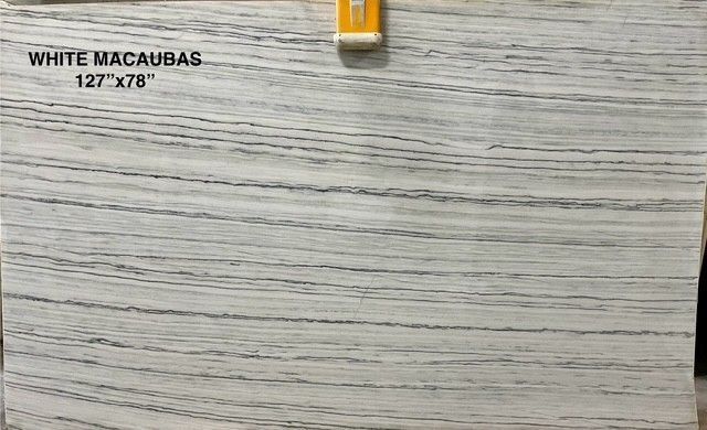 White Macaubas marble slab with gray horizontal veining