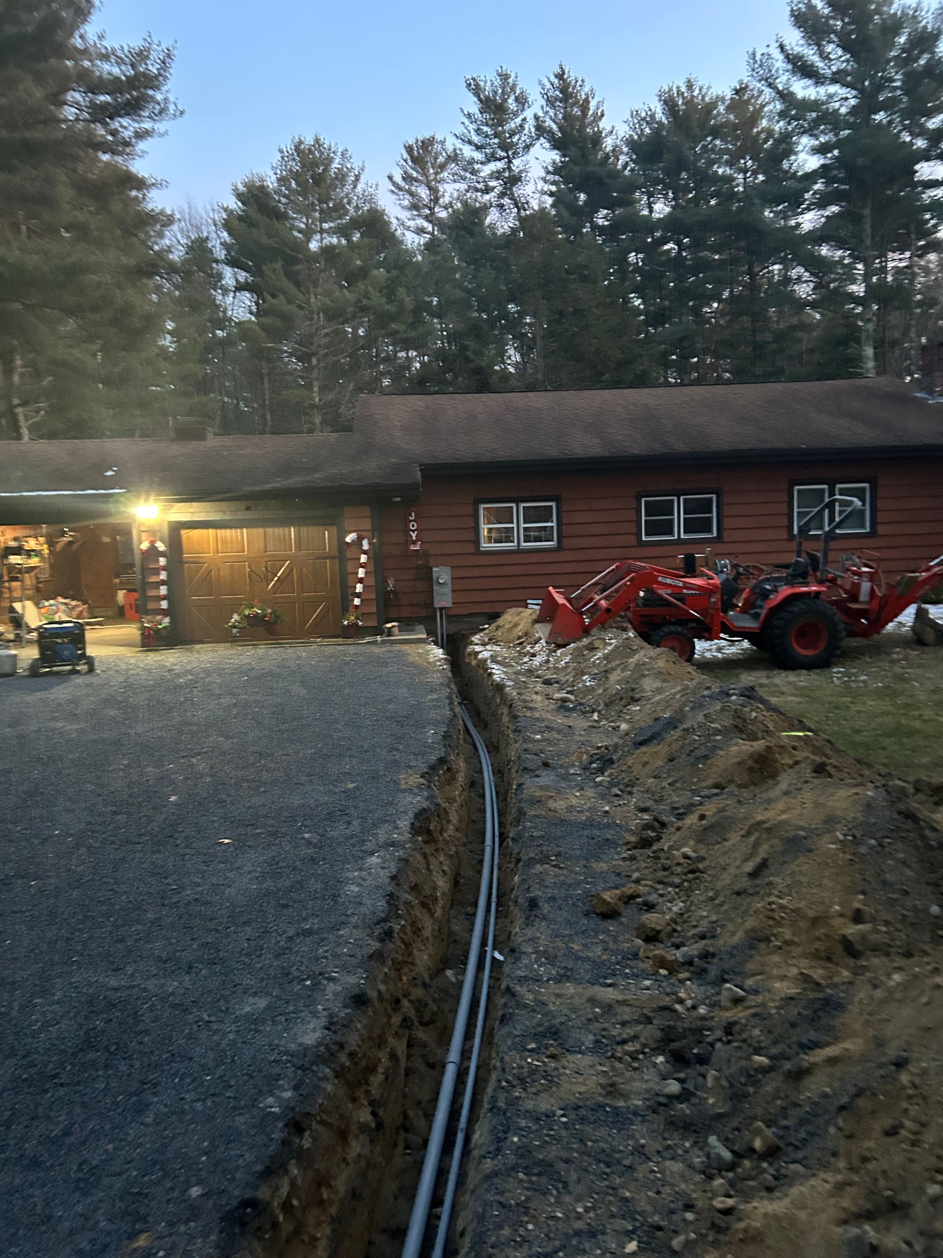 A house with a lot of dirt in front of it