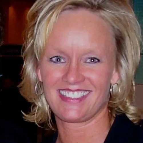 Dr. Susan Wurtele smiling with light eyes and a black jacket.