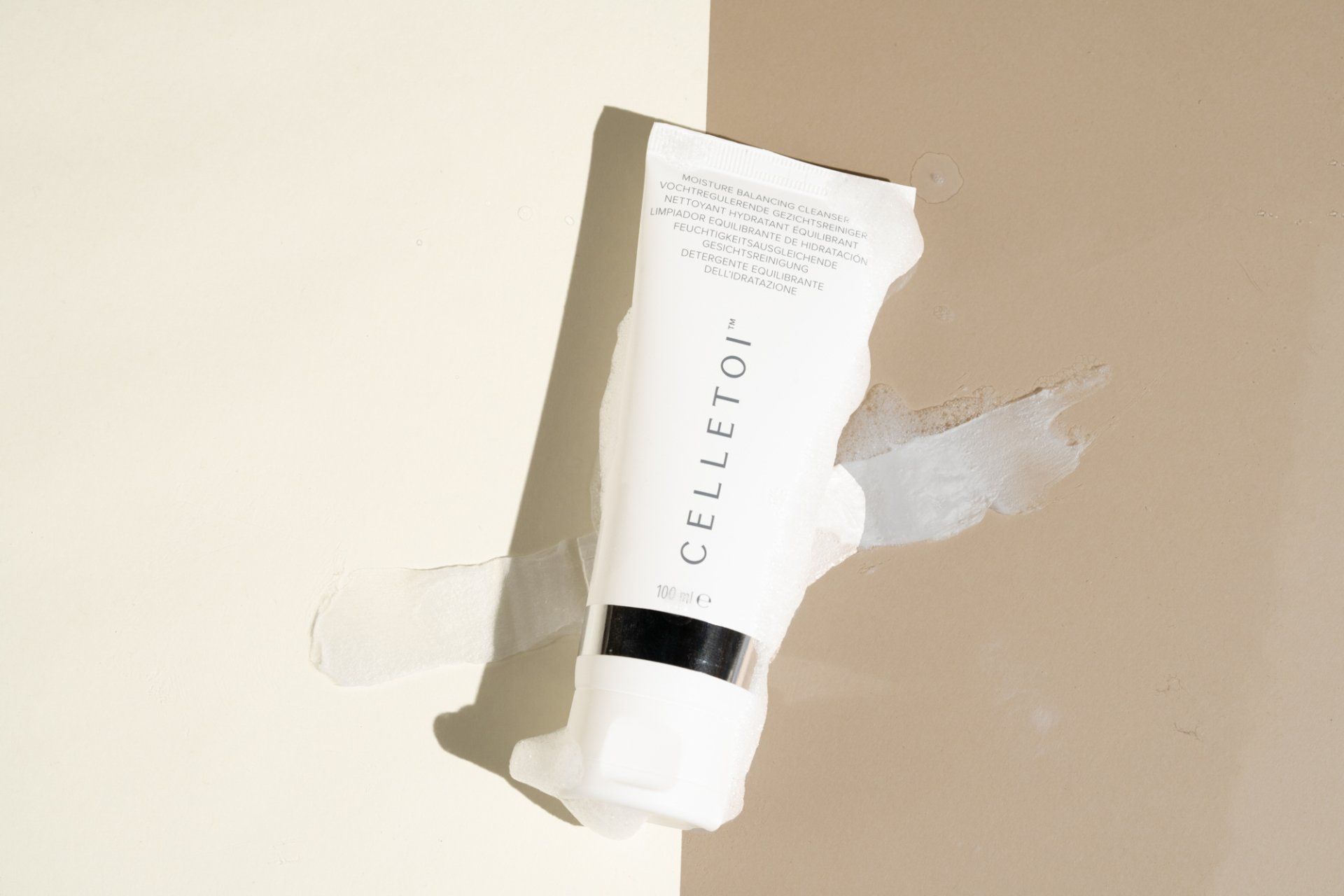 White skincare tube labeled