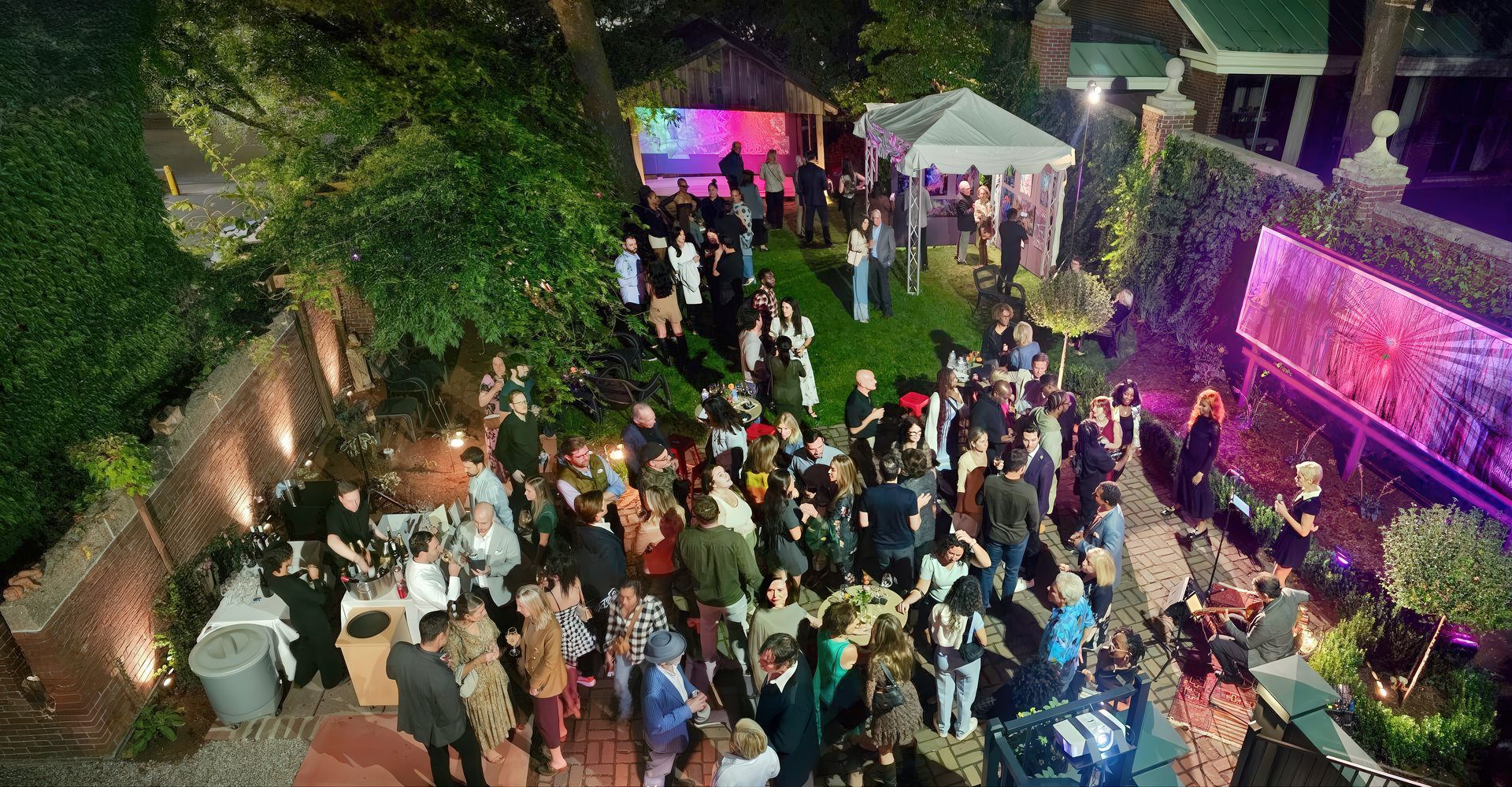 An aerial view of a large group of people at a party.