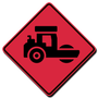 A red sign with a black tractor on it