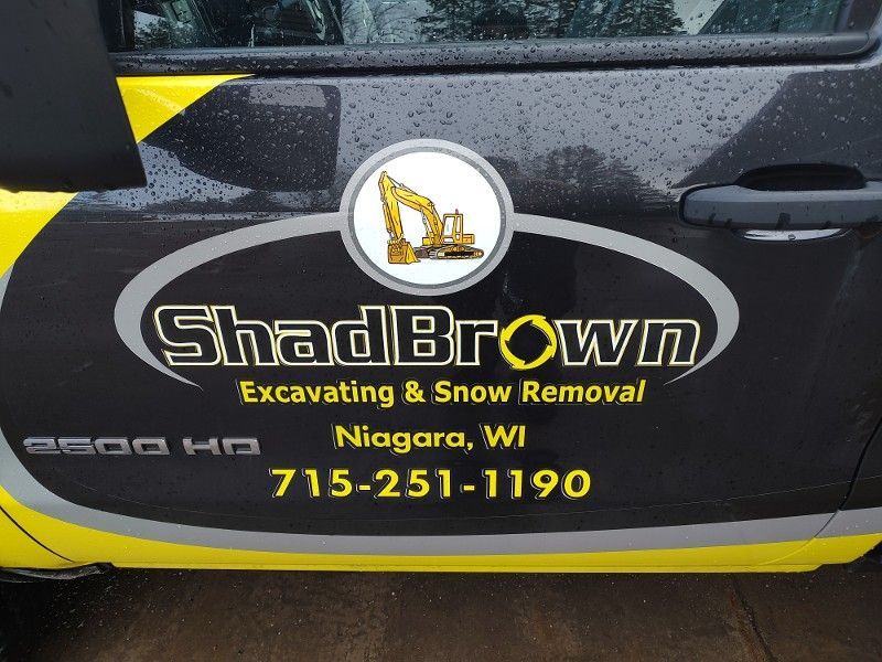 A shadbrown excavating and snow removal vehicle in niagara wi