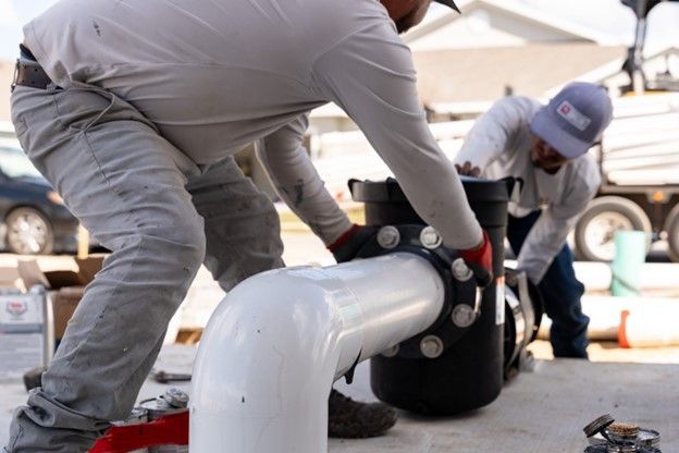 Pool builders at Family Pools are installing a new pump